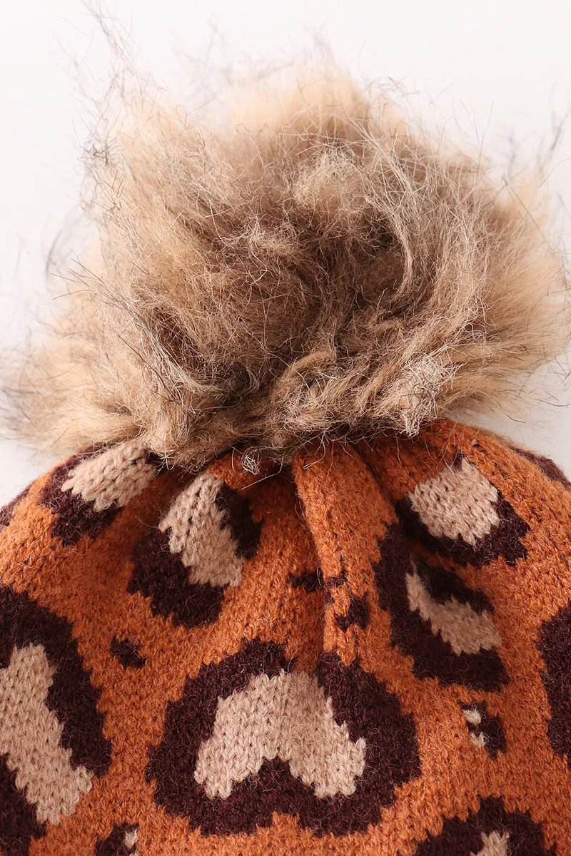 Brown pompom leopard cable beanie