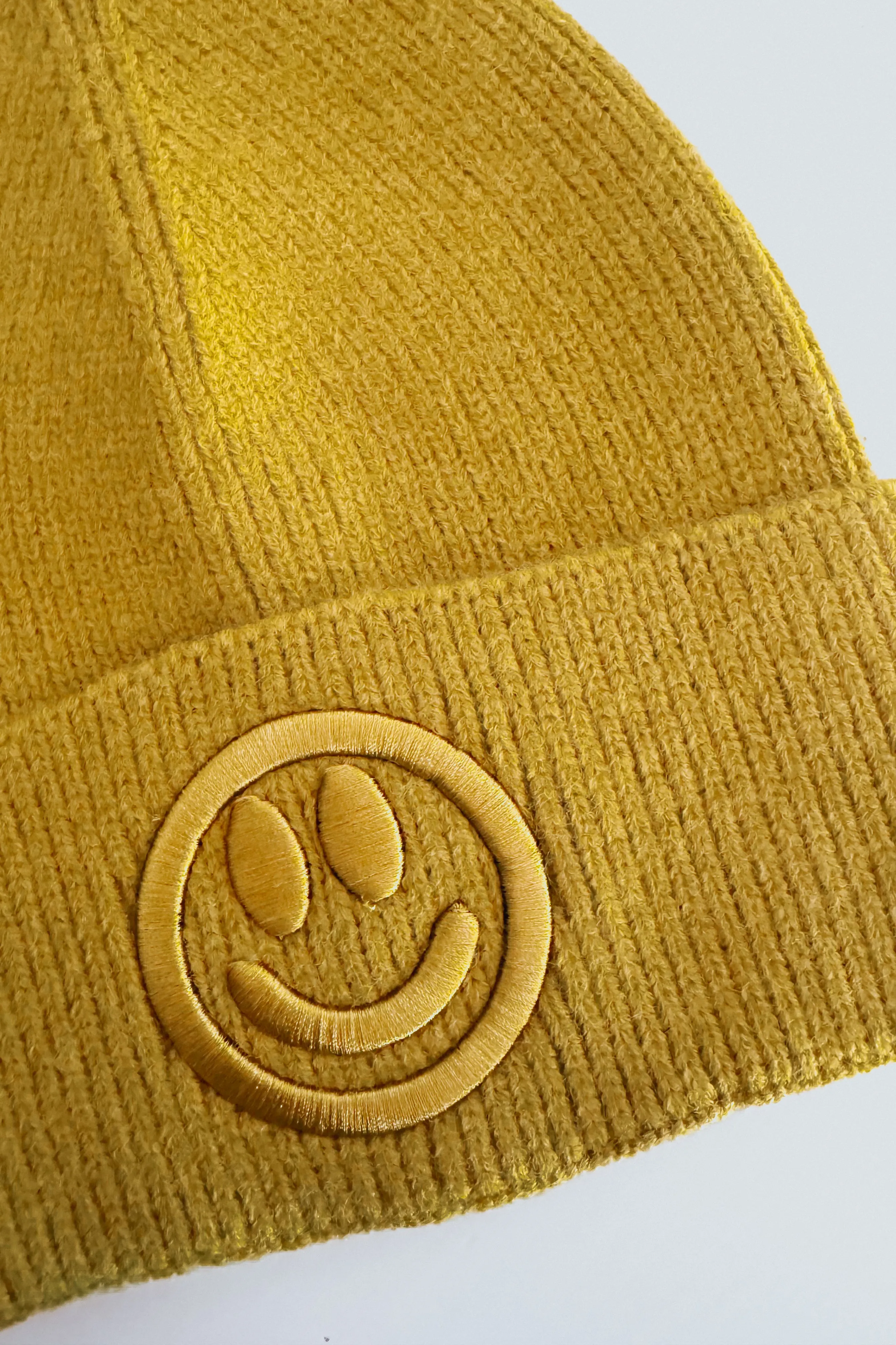 Cause I’m Happy Embroidered Ribbed Knit Beanie