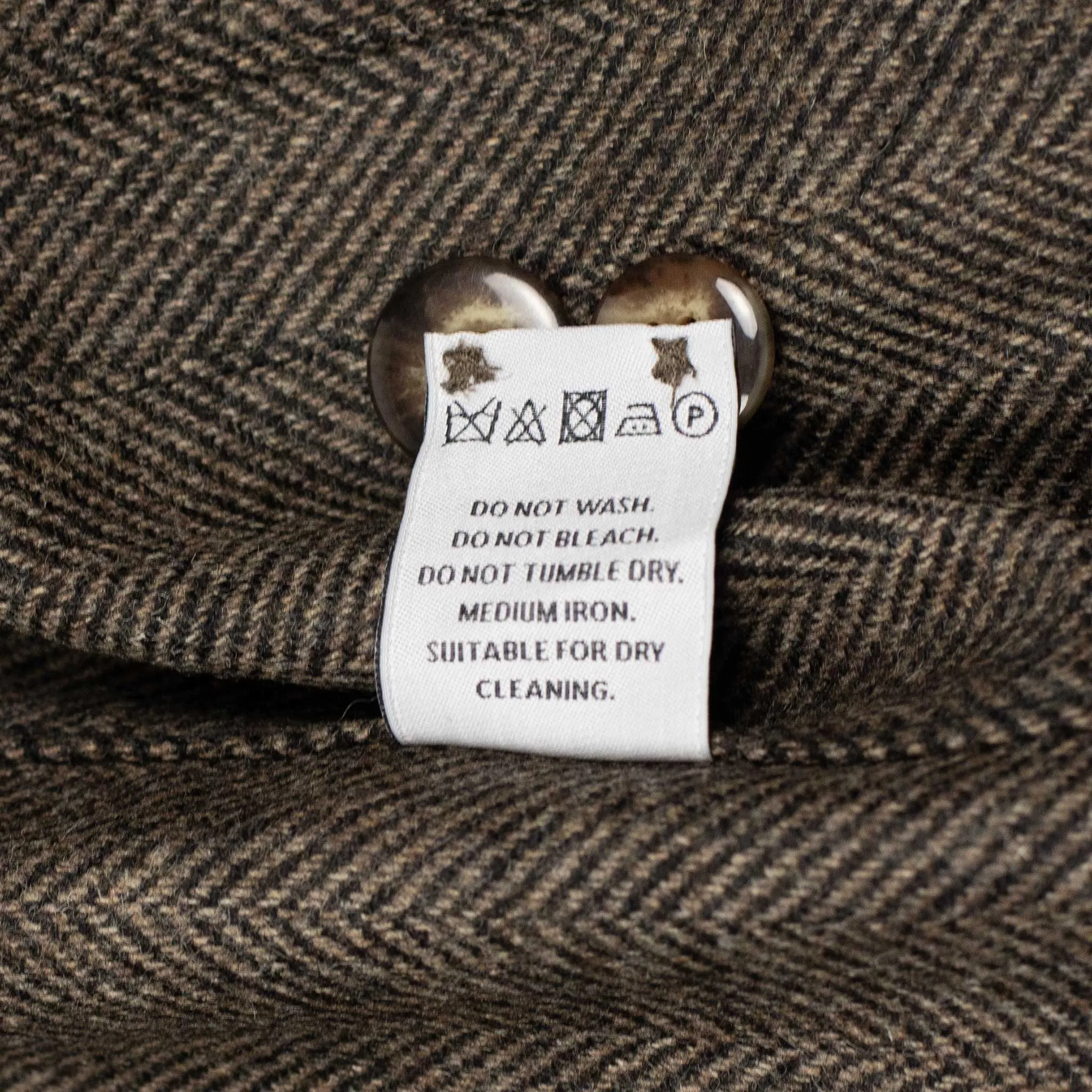 Labura chore coat in brown and black herringbone brushed wool