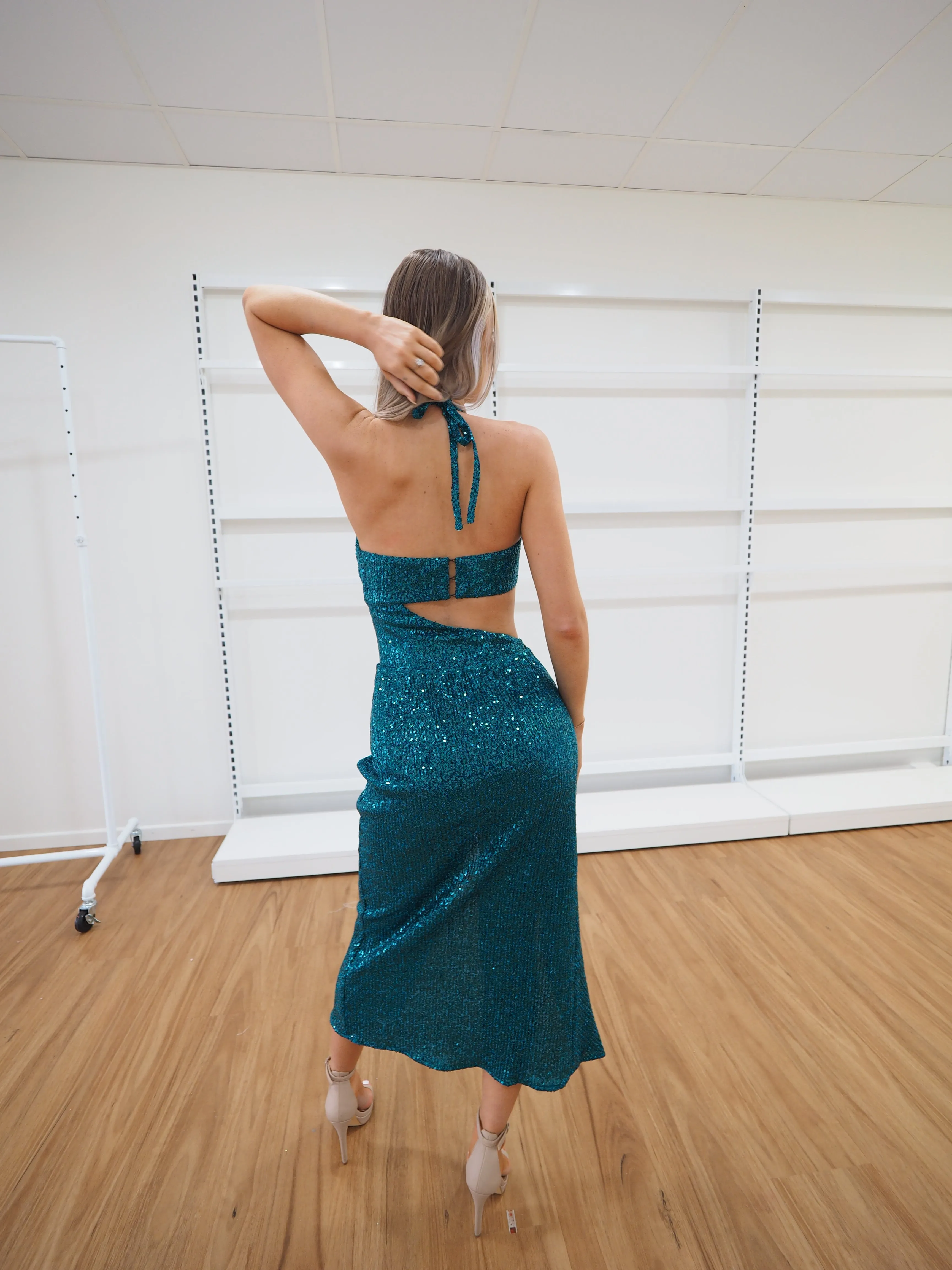 Two piece set in emerald green sequin fabric